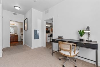 Spacious room with desk and chair
